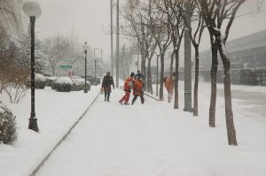 Workers in Winter frequently have to shovel snow. 