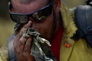 Blue Collar Worker dealing with the Summer Heat. 