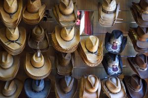 Cowboy Hats in Music City are used to celebrate lower Tennessee Workers Compensation Rates 2019